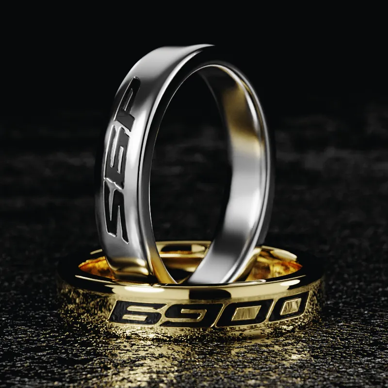 Two SPX6900 bands, one white gold and one yellow gold, engraved SPX and 6900
